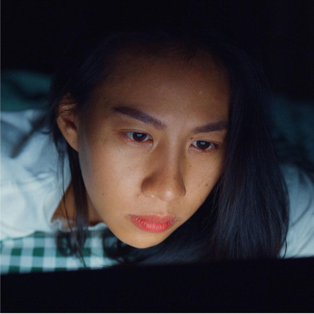 looking at the laptop at night